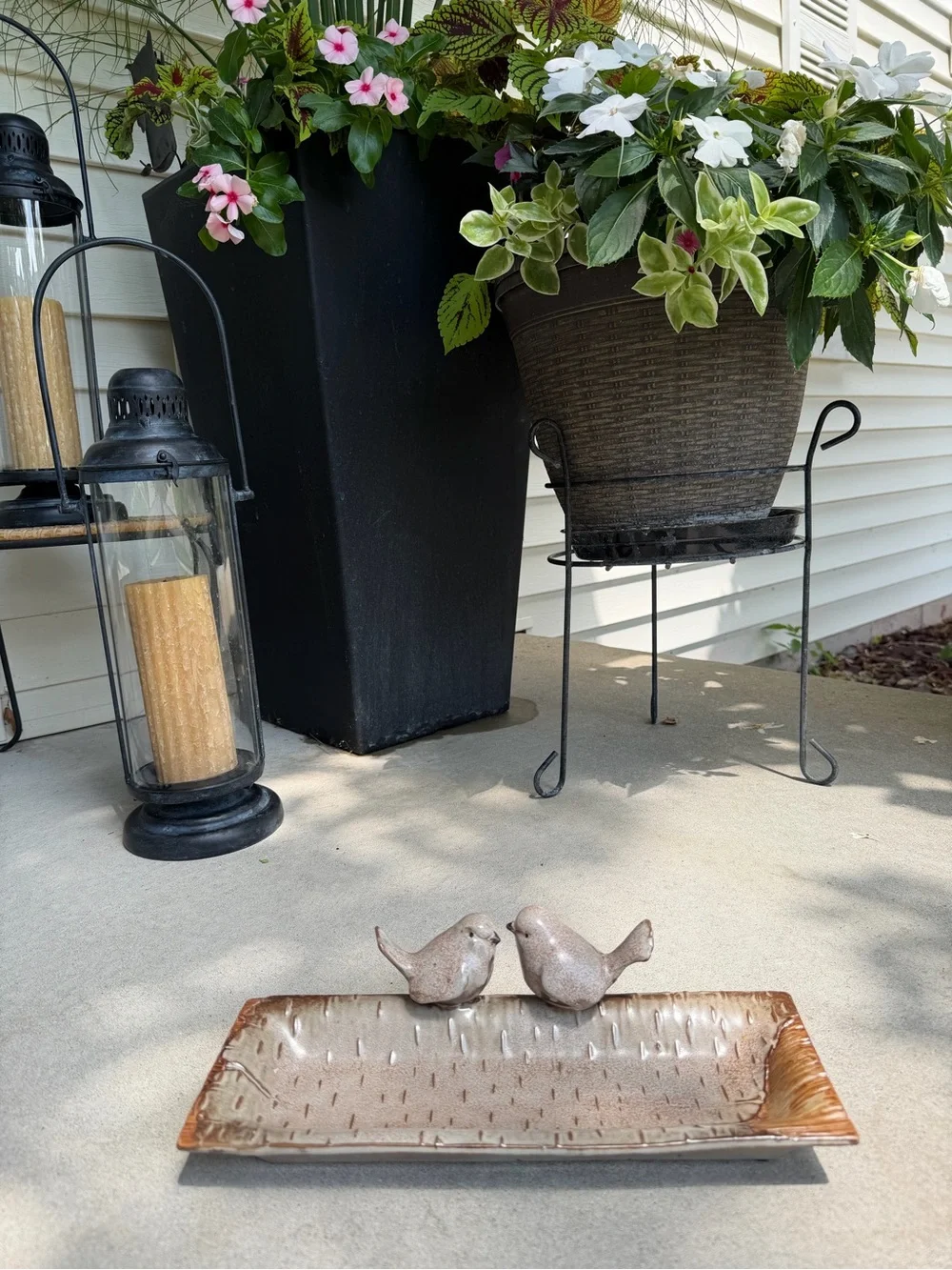 Ceramic bird feeder/tray.
